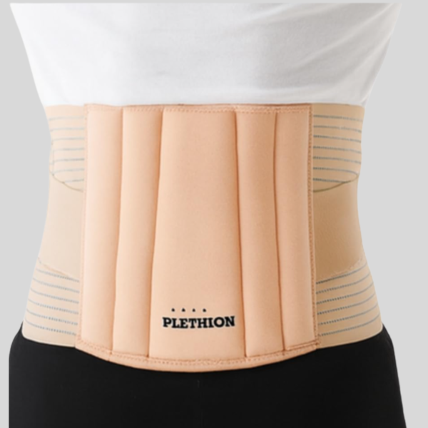 Woman wearing PLETHEON lumbar support belt providing lower back support and pain relief
