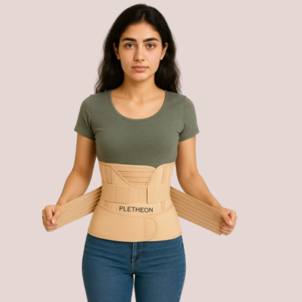 Woman wearing 3-in-1 postpartum abdominal belt for post pregnancy belly and waist support