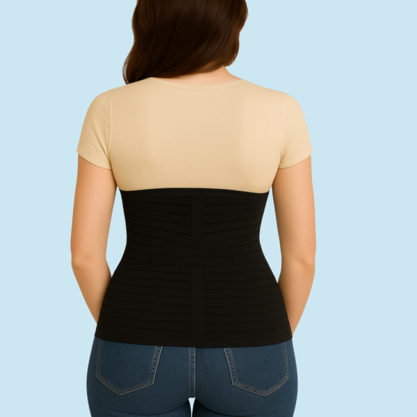 Woman wearing 3-in-1 postpartum abdominal belt for post pregnancy belly and waist support