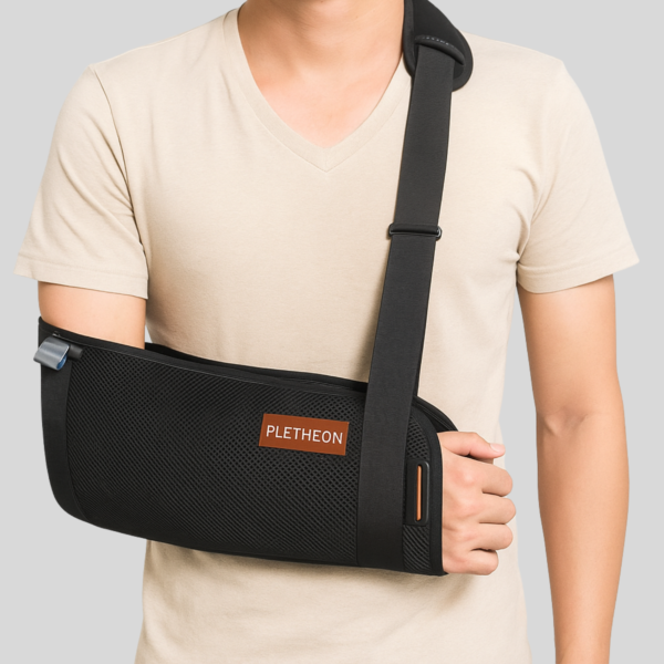 Arm sling support brace worn for shoulder and arm injury recovery